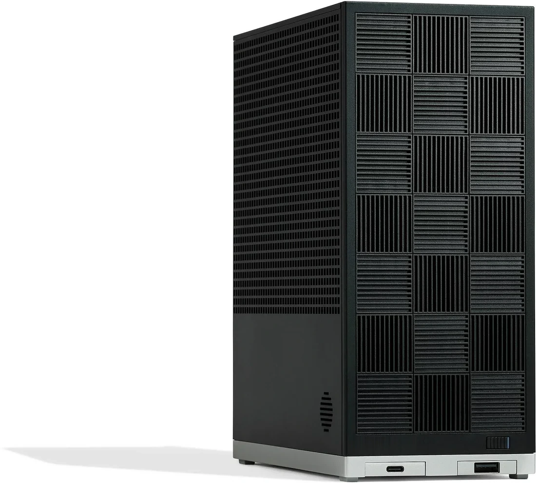 The Inplant appliance: a compact matte-black tower with a perforated front panel, silver base and front-facing USB ports